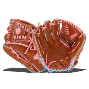 Front view of a brown baseball glove with pink and blue lacing, featuring the Rawlings logo and "Heart of the Hide" branding.