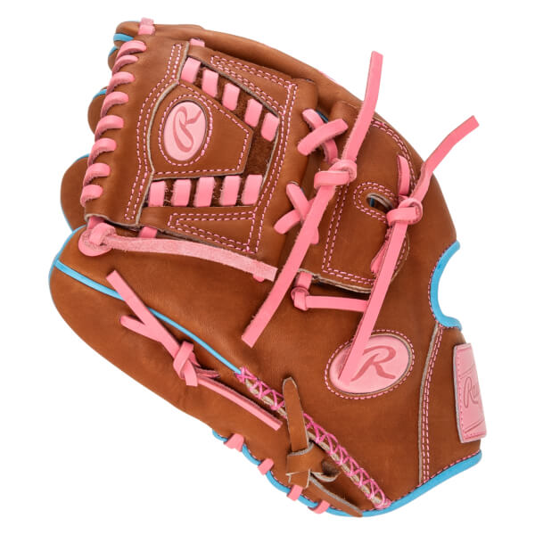 Close-up of a brown baseball glove with pink lacing and blue trim, featuring a pink "R" logo.