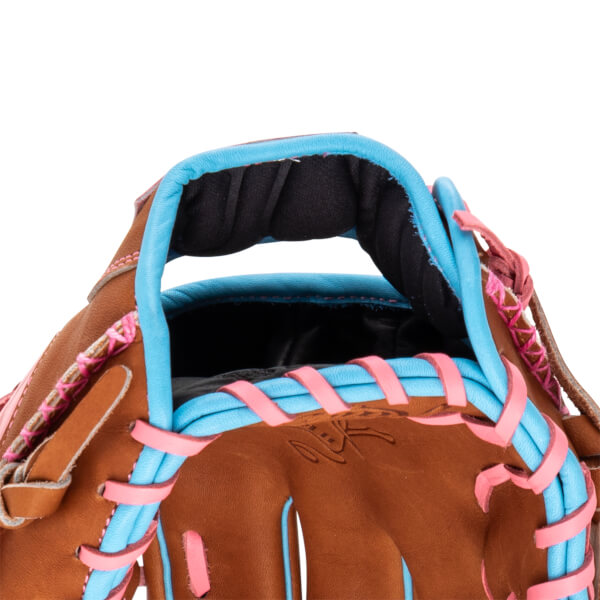 Close-up of a brown baseball glove showing blue and pink lacing and a debossed logo.