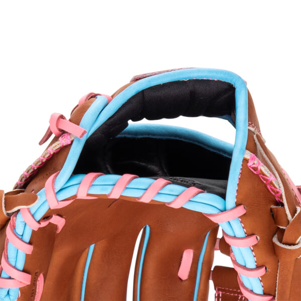 Close-up of a brown baseball glove with blue and pink lacing and a black padded wrist strap.
