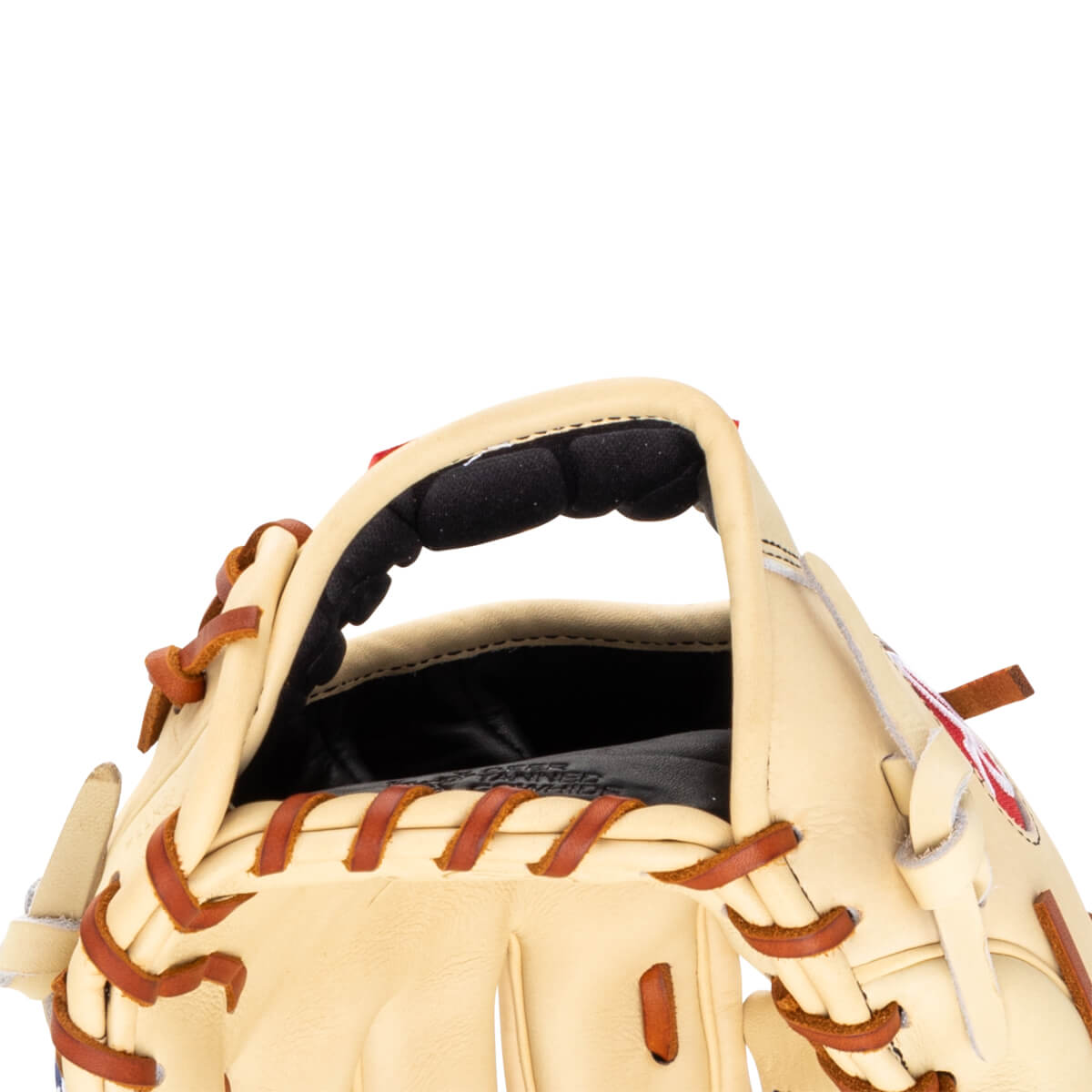 Close-up of the opening of a tan baseball glove, showing the padded wrist area and brown lacing.