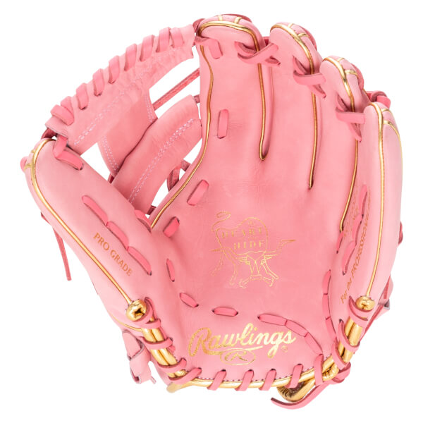 Front view of a pink Rawlings baseball glove with gold accents, "PRO GRADE" text, and a heart logo.