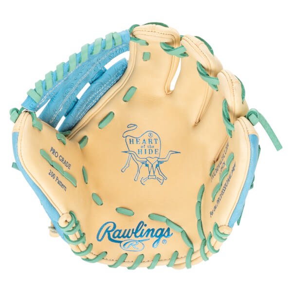 Top-down view of a Rawlings baseball glove with blue and mint green accents, featuring "PRO GRADE 200 Pattern" and a "Heart of the Hide" logo.