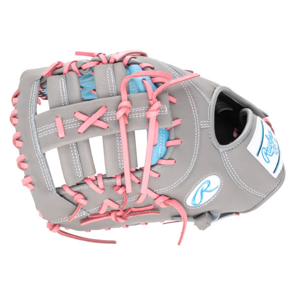 Top-down view of a gray baseball glove with pink lacing and a blue interior, featuring a Rawlings logo.