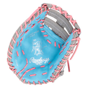 Interior view of a Rawlings baseball glove with a blue palm, gray finger stalls, and pink lacing.