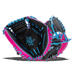 Interior view of a black baseball glove with bright pink and blue lacing, showing the "Heart of the Hide" logo.