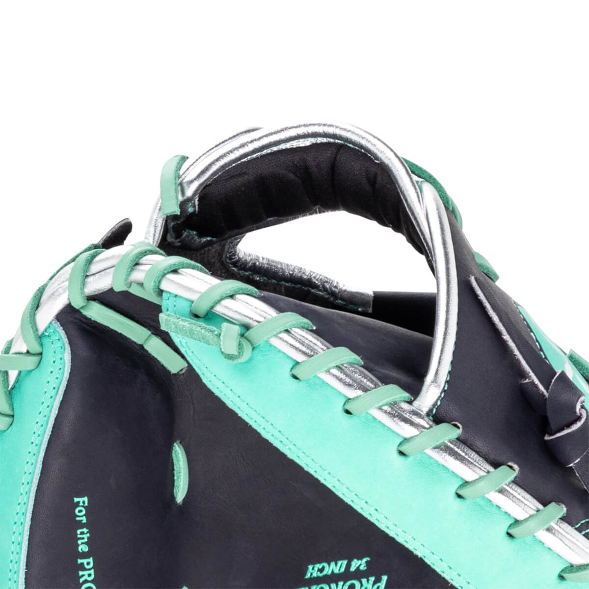 Close-up of a baseball glove showing teal lacing, silver accents, and "For the PRO" text.