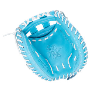 Top-down view of a bright blue baseball glove with white lacing, showing the Rawlings logo and "PRO GRADE" text.