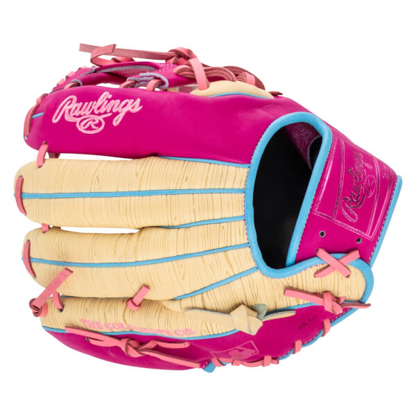 Back view of a hot pink and tan wood-grain baseball glove featuring light blue accents, pink laces, and pink "Rawlings" and "THE GOLD GLOVE CO." logos.