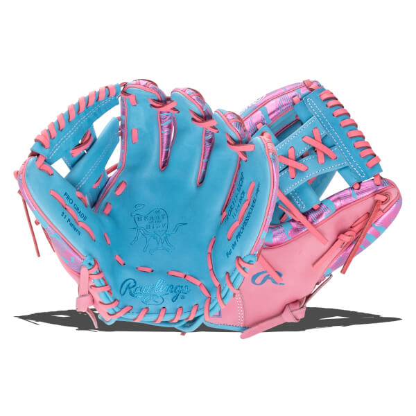 Front view of a light blue and pink baseball glove featuring pink laces, "Rawlings" and "HEART of the HIDE" logos, and "For the PROFESSIONAL player" text on the palm.