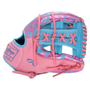 Side view of a pink and blue baseball glove featuring a patterned metallic finish, pink laces on the webbing, and a Rawlings Est. 1887 label on the wrist strap.