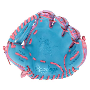 Open palm view of a light blue baseball glove with pink laces and patterned accents, featuring the HEART of the HIDE logo and Rawlings script.