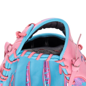 Close-up view of the wrist opening highlights pink and light blue leather with pink laces and "DEER TANNED COWHIDE" embossed on the interior lining.
