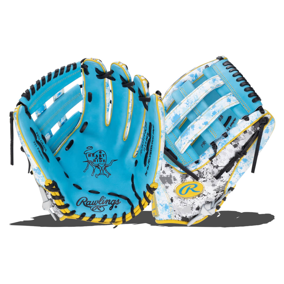 Front and back views show a light blue glove with a blue and white splatter pattern, yellow accents, and the Rawlings and Heart of the Hide logos.