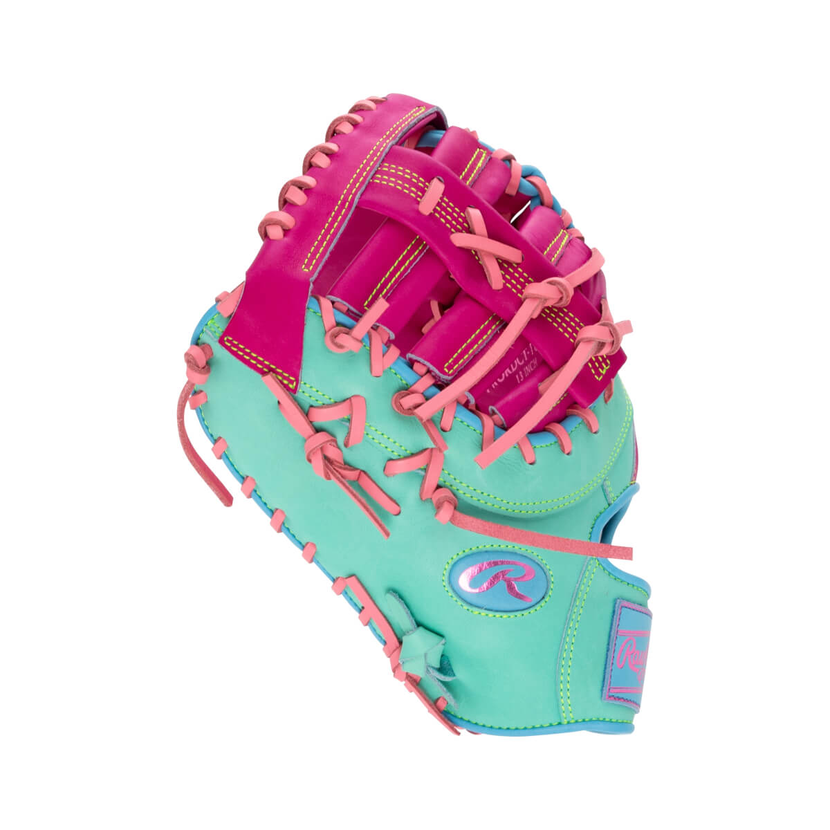 Front view of a teal and hot pink first base mitt with light pink laces, featuring the Rawlings "R" logo and the text "13 INCH" on the inner pink leather.