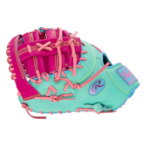 Back view of a teal first base mitt with magenta accents, light pink laces, a metallic pink "R" logo, and "Rawlings" on the wrist strap.