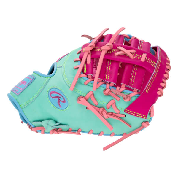 Back view of a mint green and magenta first base mitt featuring light pink laces and a pink Rawlings "R" logo on the thumb.