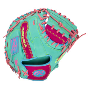 Back view of a mint green catcher's mitt with hot pink and blue accents, featuring "THE GOLD GLOVE CO." text and a pink Rawlings "R" logo on the wrist strap.