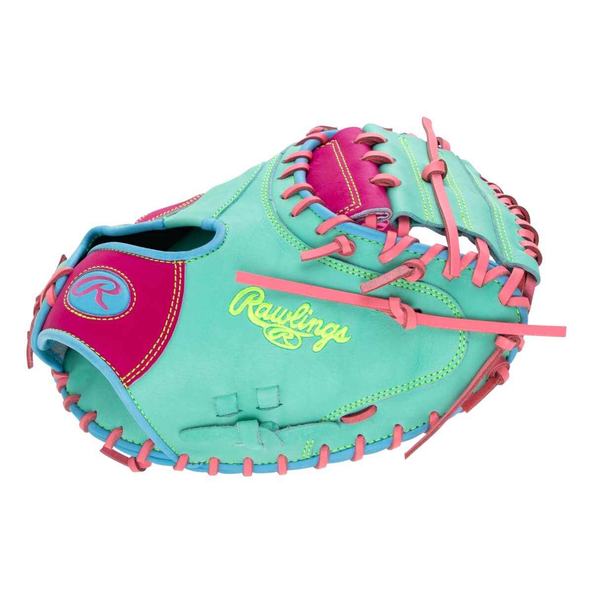 Back view of a mint green catcher's mitt featuring bright pink and blue accents, pink lacing, and "Rawlings" in neon yellow script.