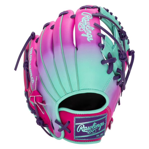 Front view of a pink, purple, and teal baseball glove with "Rawlings" logo.