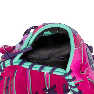 Close-up of a pink baseball glove with teal and purple lacing, showing the "COWHIDE" text.