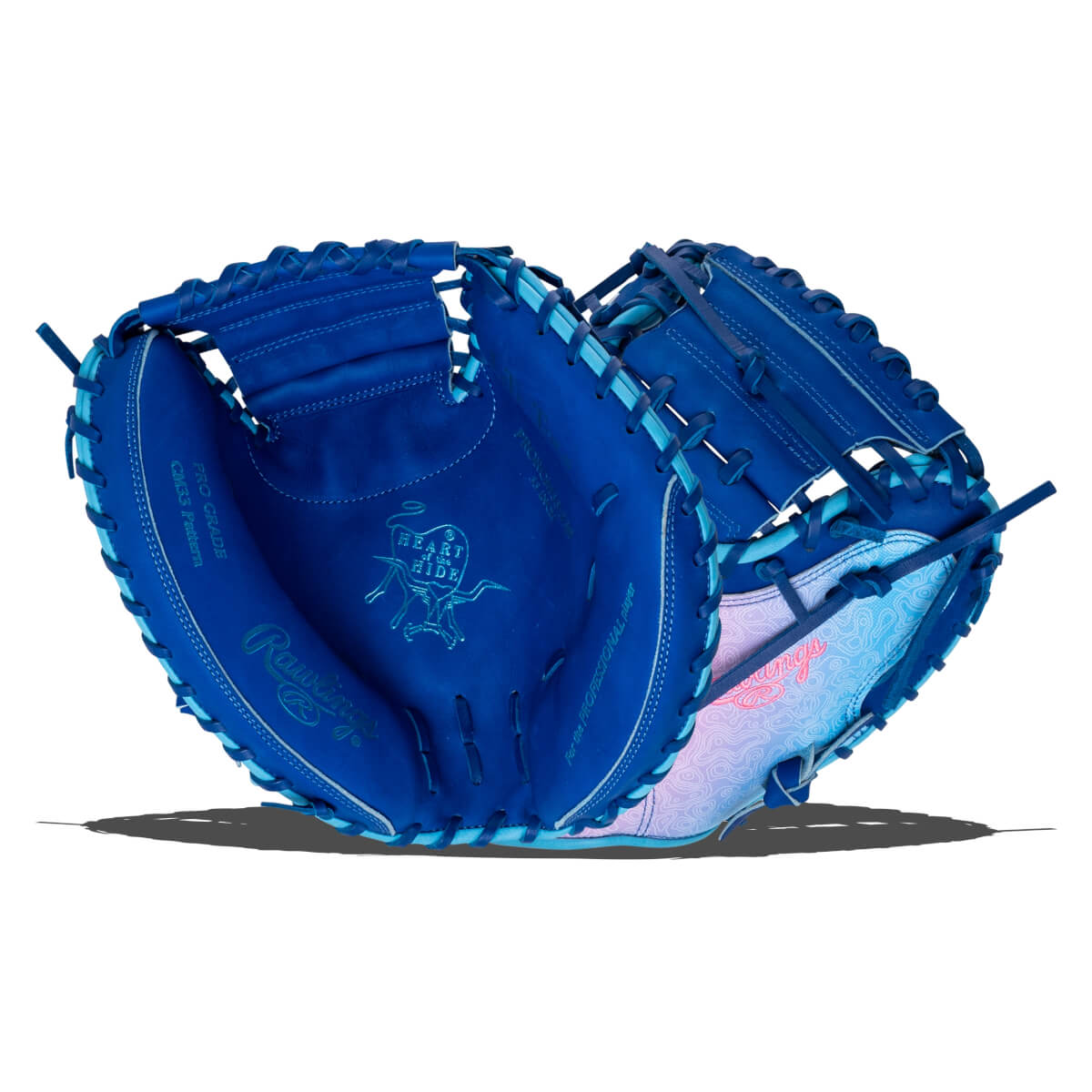 Open view of a blue Rawlings baseball glove with "PRO GRADE" and "HEART OF THE HIDE" text.