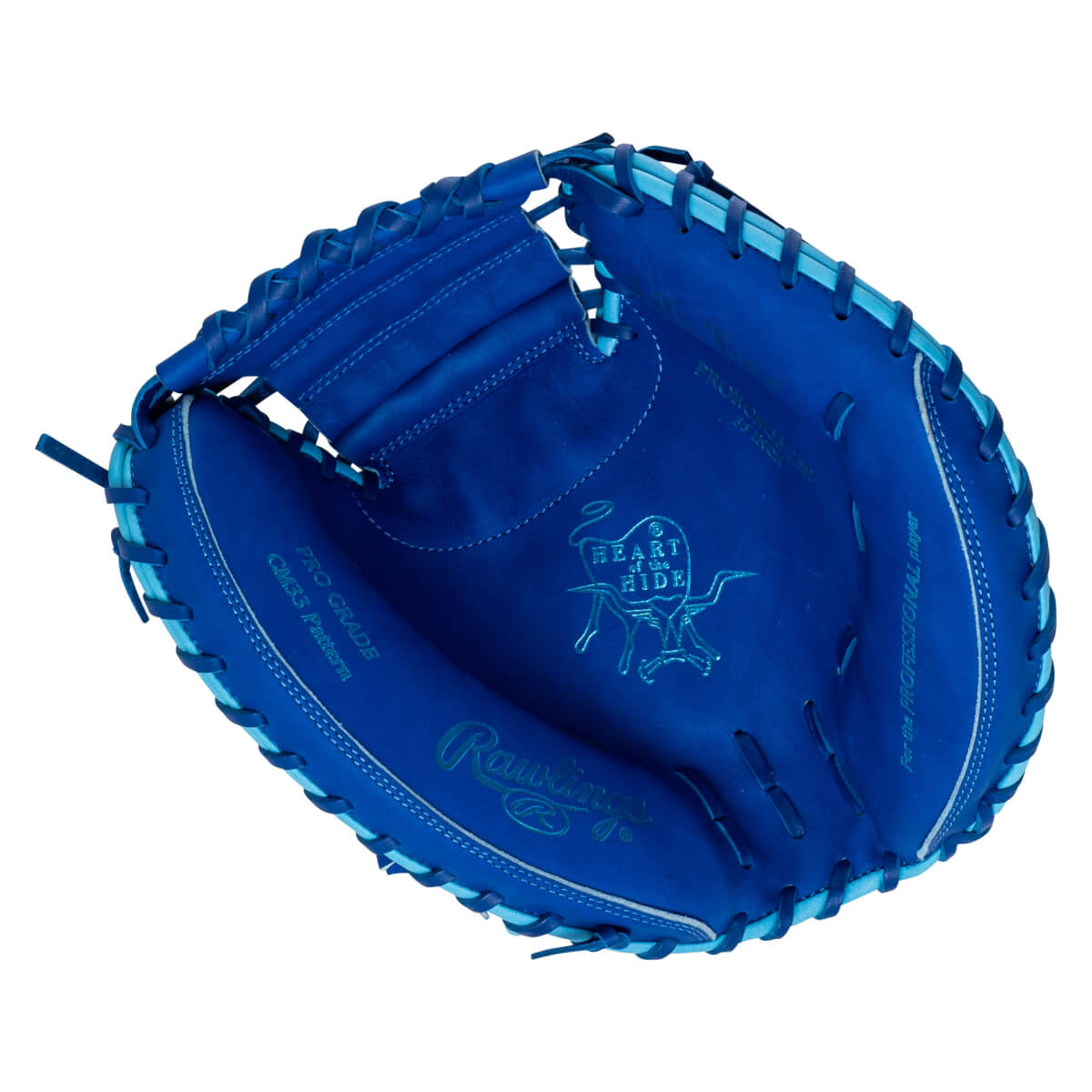 Top-down view of a blue Rawlings baseball glove with "PRO GRADE CM33 Pattern" and "HEART OF THE HIDE" logos.