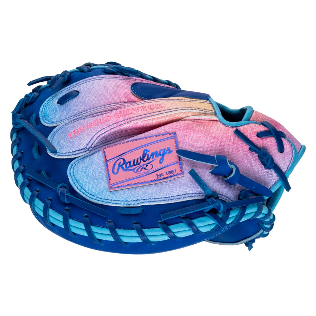 Top-down view of a blue baseball glove with a pink and blue gradient palm featuring a "Rawlings Est. 1887" patch.