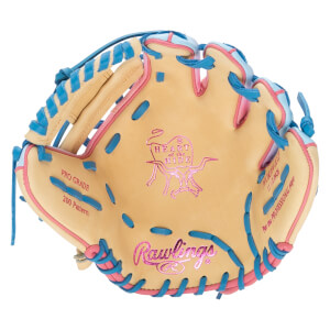 Top-down view of a tan baseball glove with pink and blue lacing, featuring "Rawlings" and "Heart of the Hide" logos.