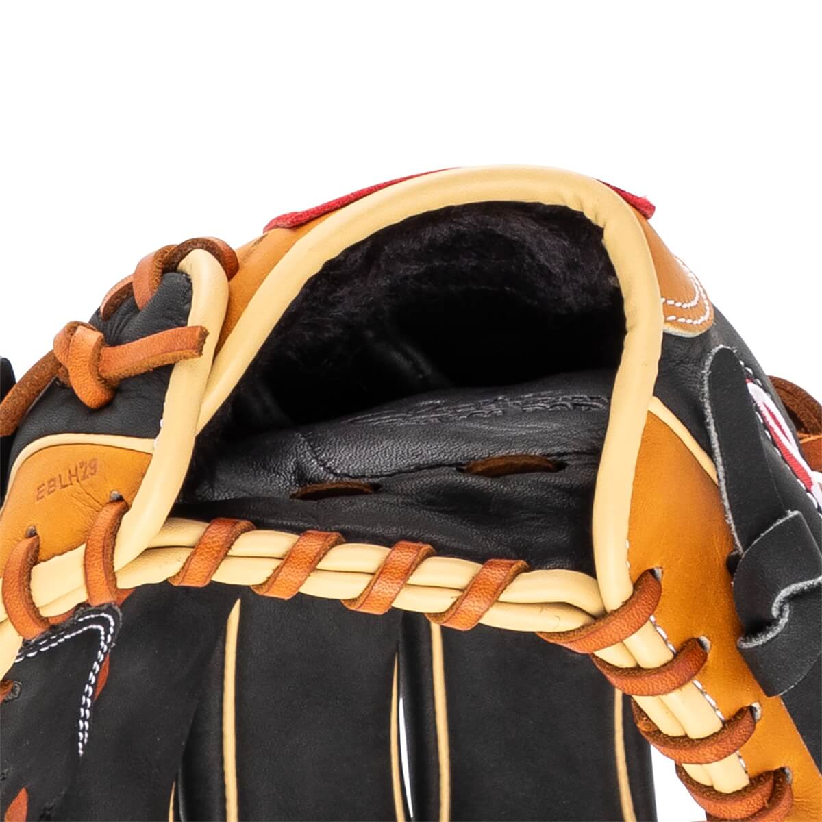 Close-up of a black and tan baseball glove with tan lacing and red trim.