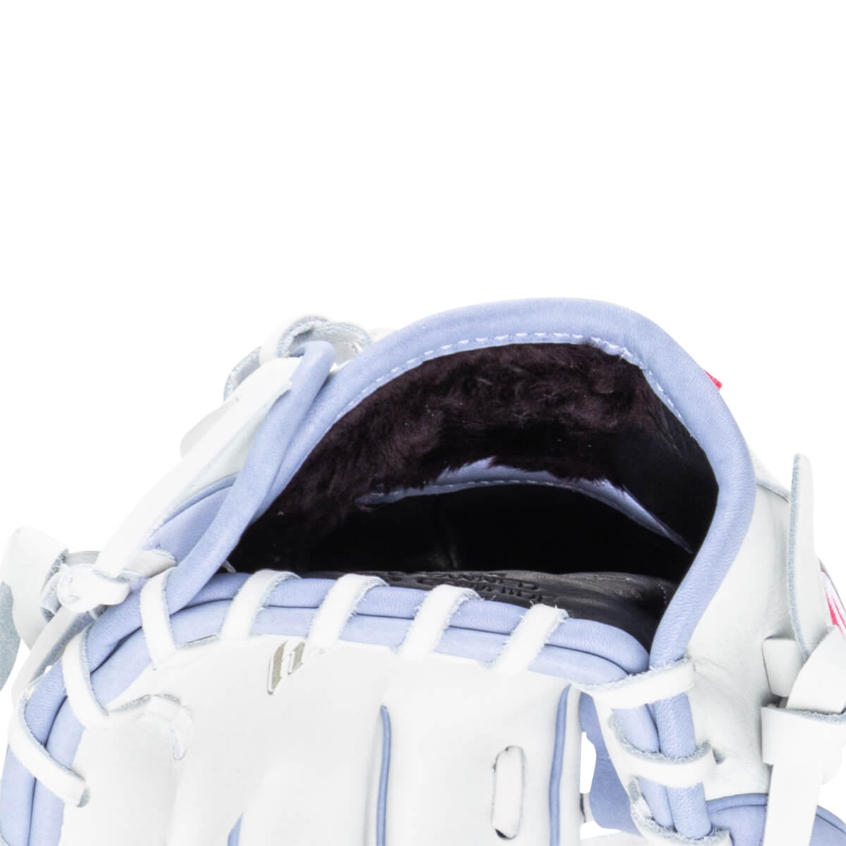 Close-up of the interior of a white baseball glove with purple trim and dark fur lining.