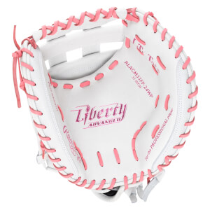 Top-down view of a white baseball glove with pink lacing, showing "Liberty ADVANCED" and "RLACM33FP-24WP 33 INCH".