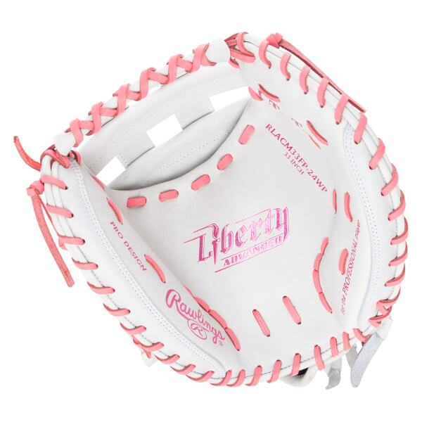 Top-down view of a white baseball glove with pink lacing and "Liberty Advanced" and "Rawlings" logos.