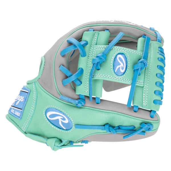 Side view of a mint green and gray baseball glove with blue lacing and Rawlings logos.