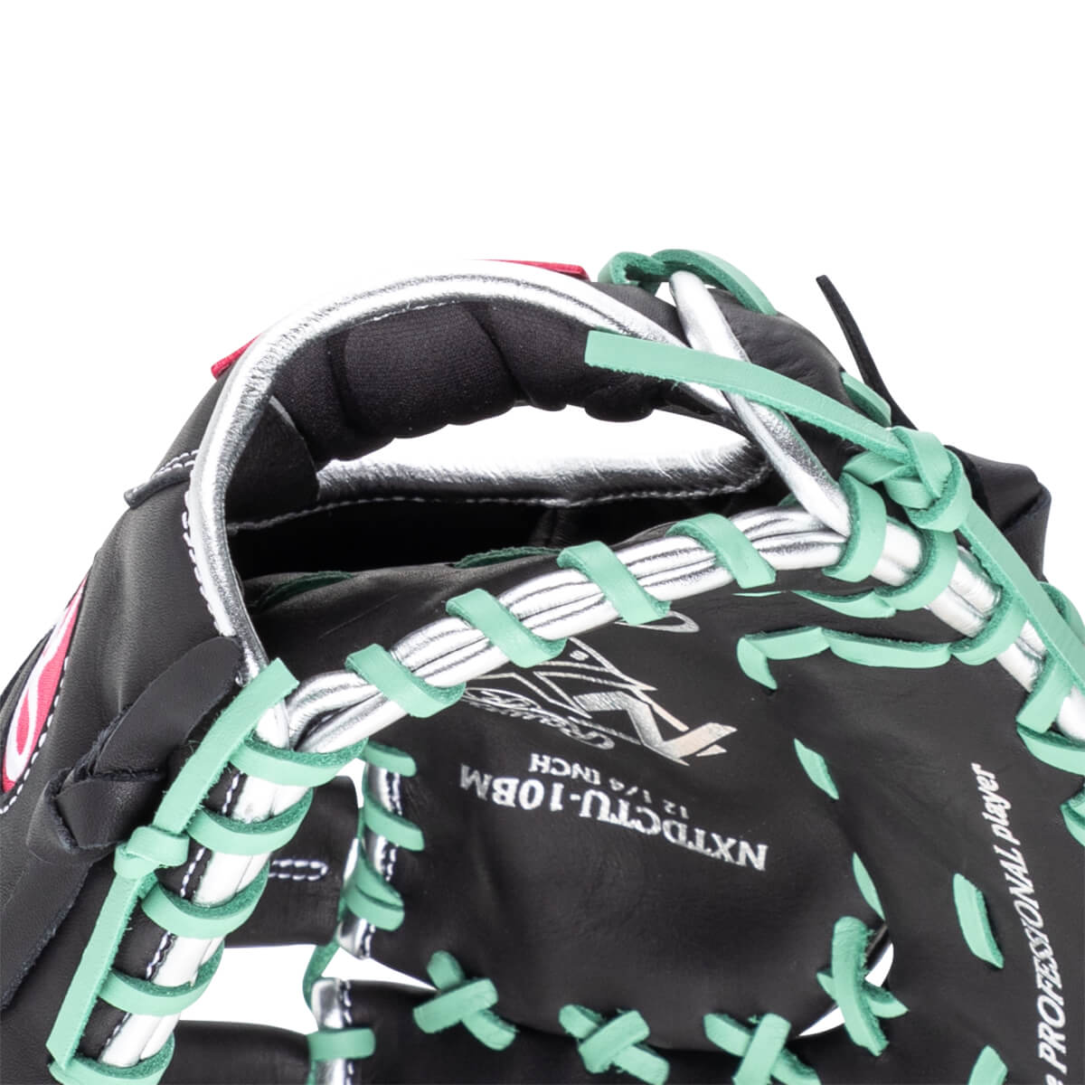 Close-up of a black baseball glove with mint green lacing and silver trim, showing "NXTDC TU-10BM" and "PROFESSIONAL PLAYER".