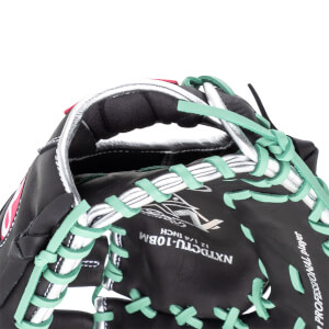 Close-up of a black baseball glove with mint green lacing and silver trim, showing "NXTDC TU-10BM" and "PROFESSIONAL PLAYER".