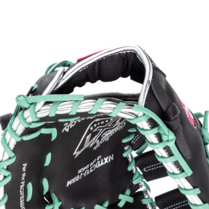 Close-up of a black baseball glove with mint green lacing and silver accents, showing the Rawlings logo and "NXTDC TU-10BM".