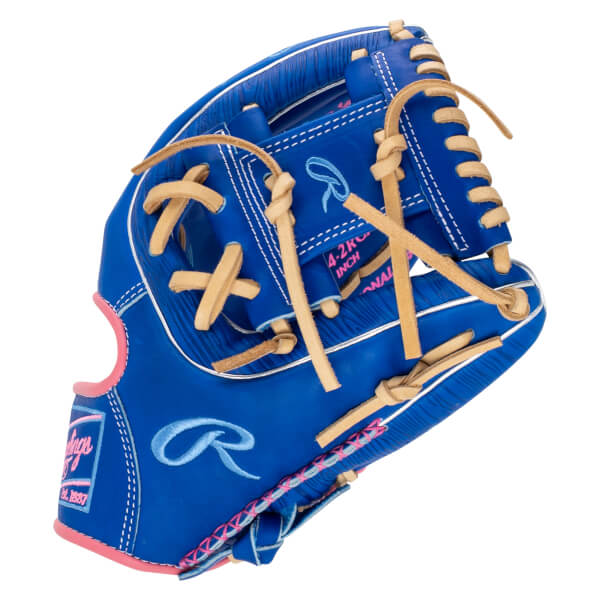 Top-down view of a blue baseball glove with tan laces, a pink trim, and "Rawlings" embroidered on the side.