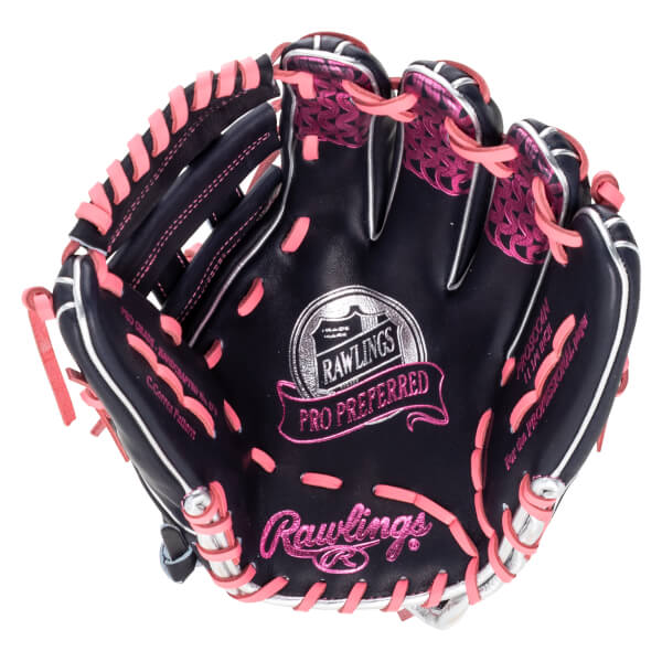 Top-down view of a navy baseball glove with pink lacing and accents, featuring "Rawlings" and "PRO PREFERRED" text.