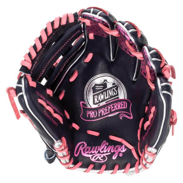 Top-down view of a navy baseball glove with pink lacing and "Rawlings PRO PREFERRED" text.