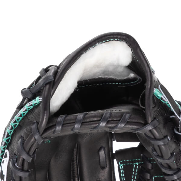 Close-up of a black baseball glove showing the padded interior, teal stitching, and leather lacing.