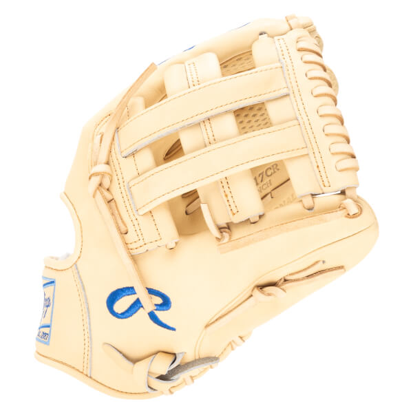 Top-down view of a tan baseball glove with a blue Rawlings "R" logo and "EST. 1887" text.