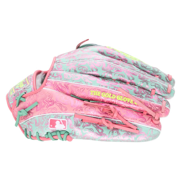 Side view of a pink and teal baseball glove with a swirling pattern and "THE GOLD GLOVE" text.