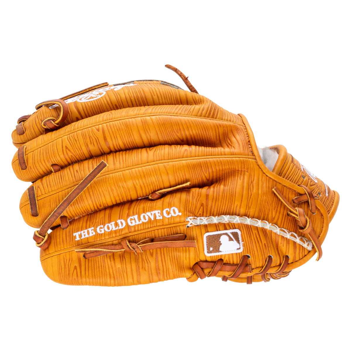 Side view of a tan baseball glove with wood grain texture, featuring "THE GOLD GLOVE CO." and an MLB logo.