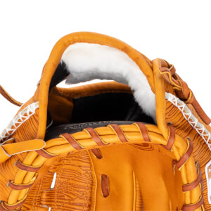 Close-up of the inside of a baseball glove showing tan leather, white fur lining, and brown lacing.