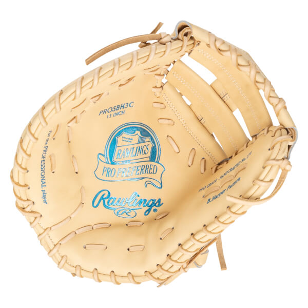 Top-down view of a tan Rawlings Pro Preferred baseball glove with blue lettering and lacing.