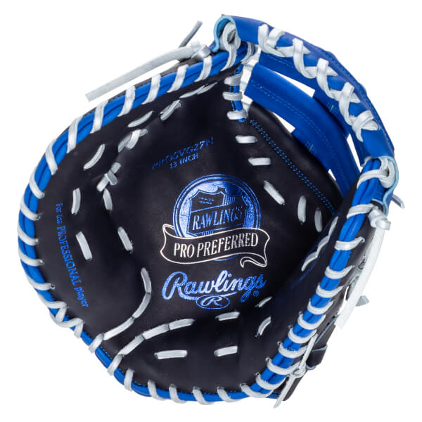Top-down view of a navy and blue Rawlings Pro Preferred baseball glove with white lacing and visible "PROSVG27N 13 INCH" text.