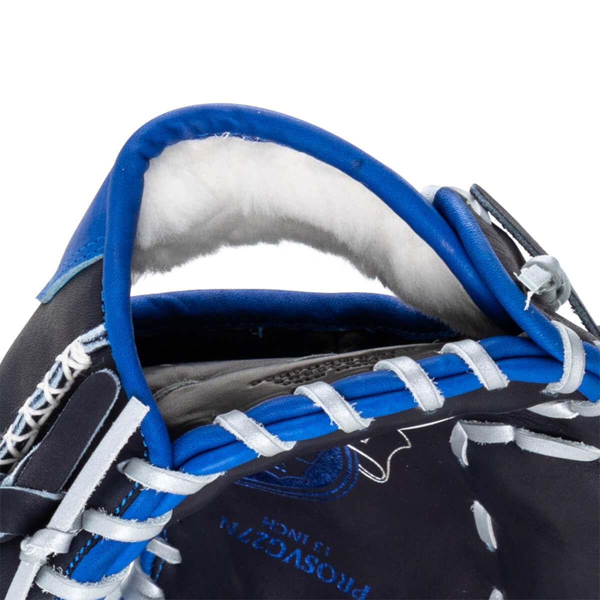 Close-up of a navy baseball glove with bright blue trim and white lacing, showing the "PROSVG27N 13 INCH" text.