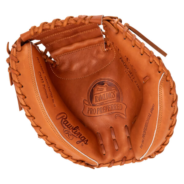 Top-down view of a brown Rawlings Pro Preferred baseball glove with "PRO GRADE HANDCRAFTED NO. 81 CM33 Pattern" and "PROSCM33-23BR 33 INCH" visible.