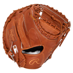 Top-down view of a brown leather baseball glove with Rawlings logo and MLB emblem.